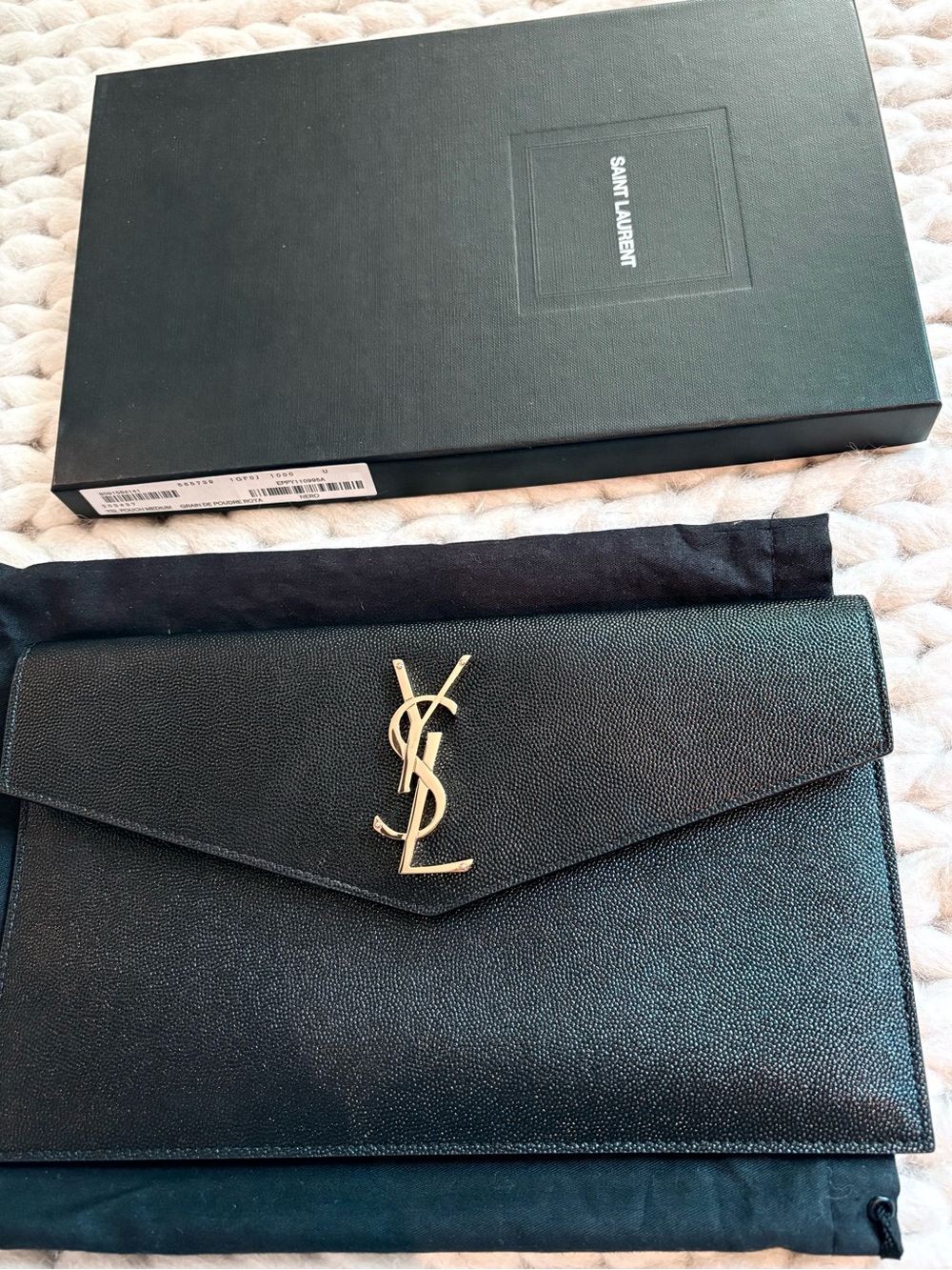 YSL Envelope Clutch with Gold Monogram. Comes with receipt from Saks